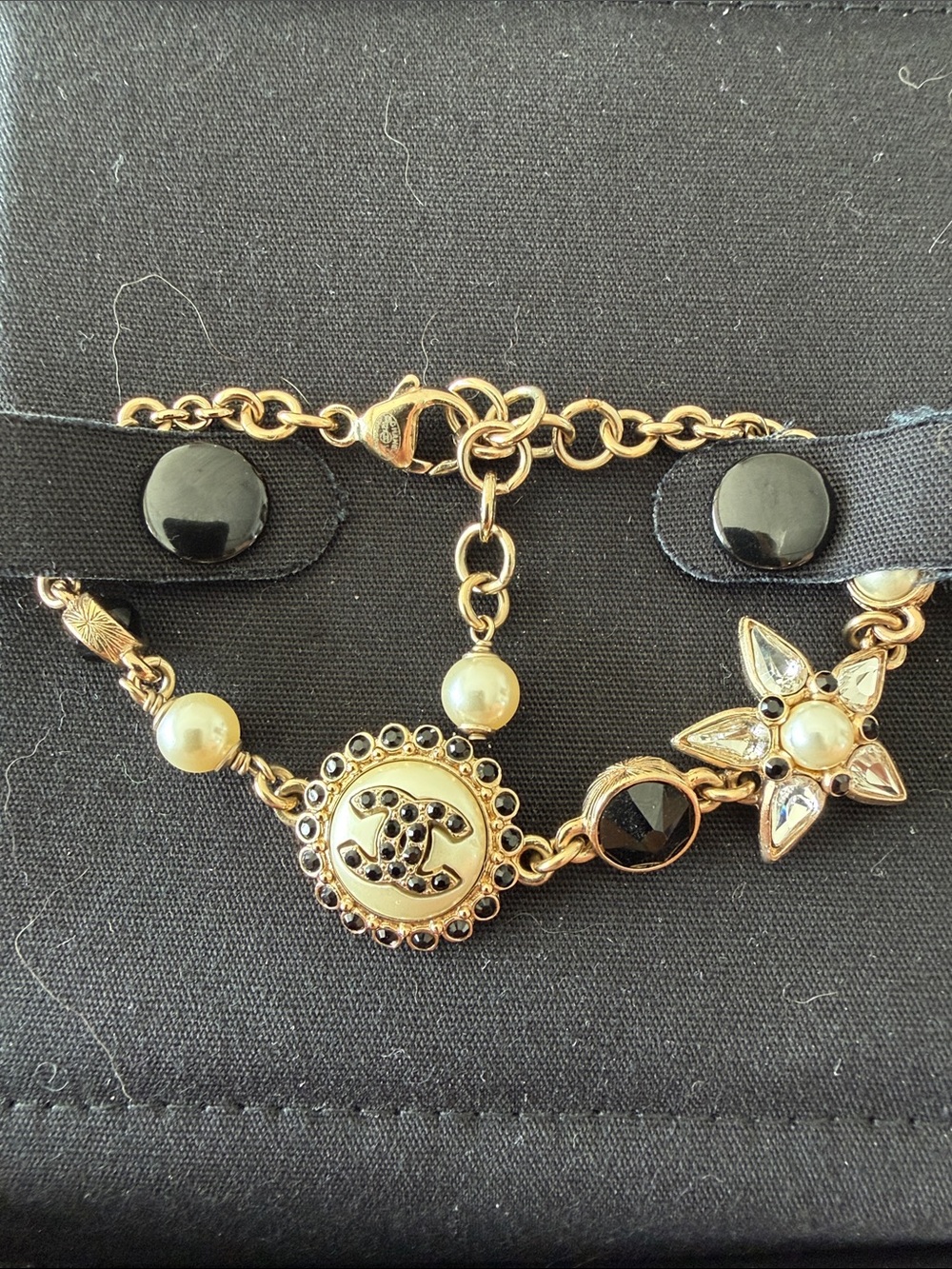 CHANEL Gold-Tone Pearl & Black Crystal Charm Bracelet